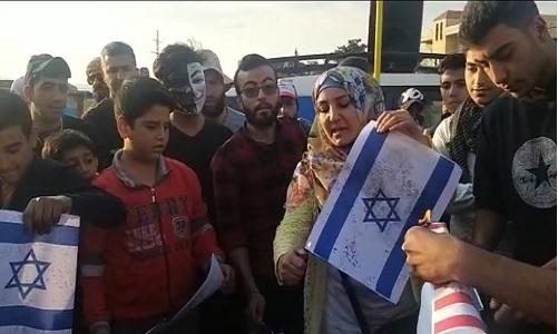 إحراق علمي إسرائيل وأميركا عند دوار دورس